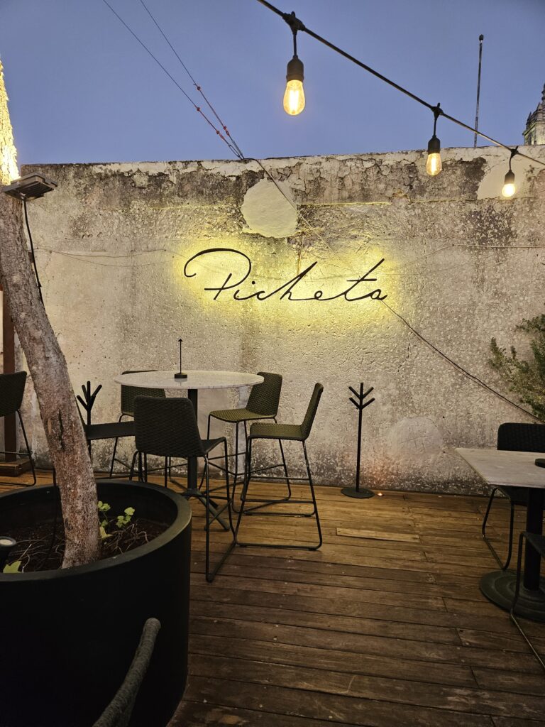 View of sign at the roof top bar, Picheta, on the plaza grande in Merida Mexico