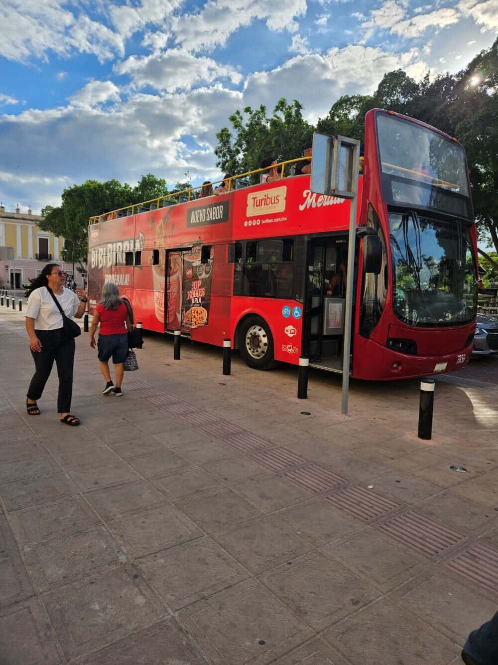 Red, double decker, turibus in Merida, Mexico