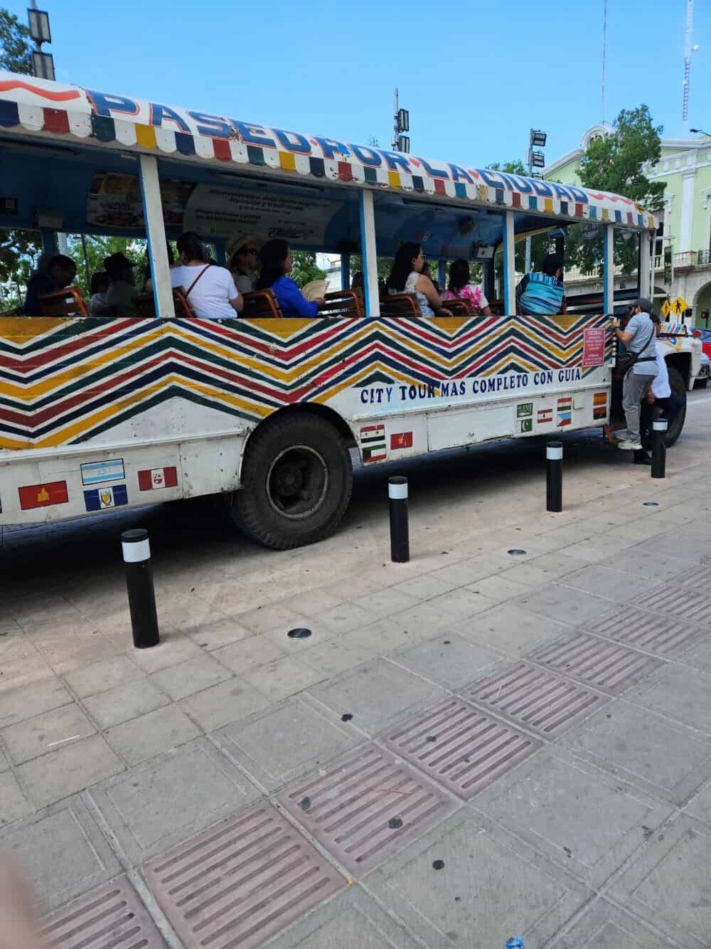 Old, refurbished school bus, open-air tour bus in Merida, Mexico