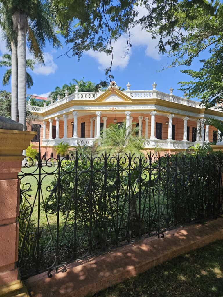 The terra cotta and white mansion, Casa Peon de Regil located along the Paseo de Montejo in Merida Mexico