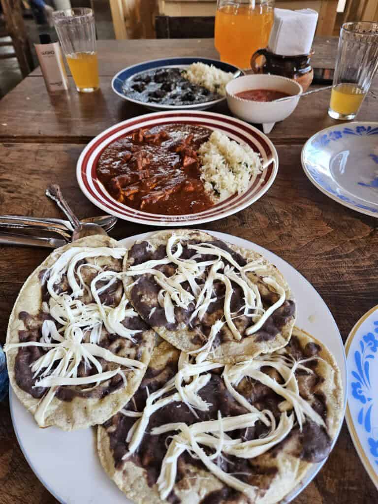 A table full of full at a restaurant in Oaxaca Mexico
