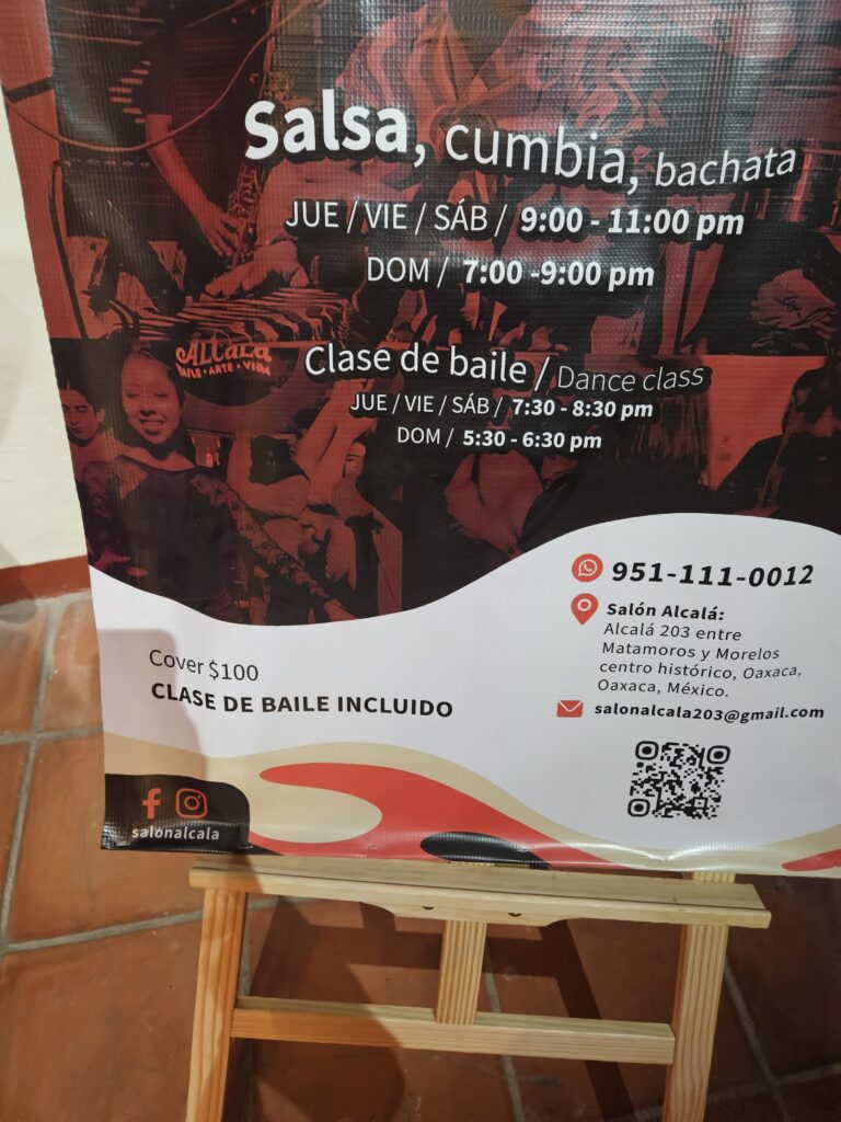 Sign advertising dance classes including salsa, cumbia and bachata in Oaxaca Mexico