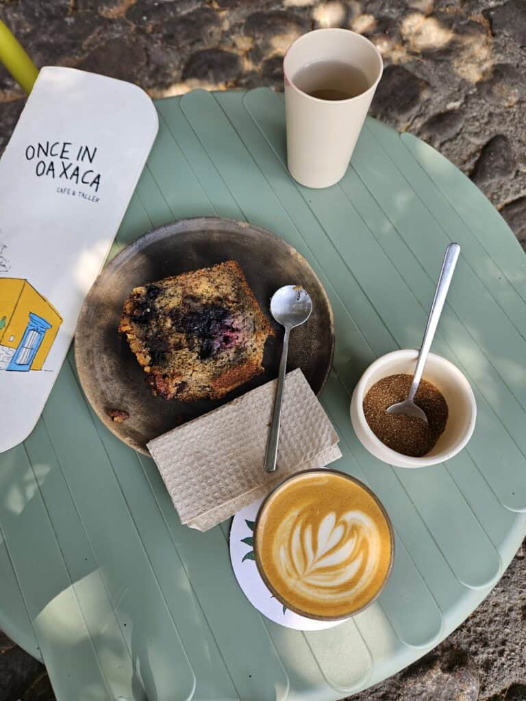 Flat white and a slice of banana bread at Once in Oaxaca cafe