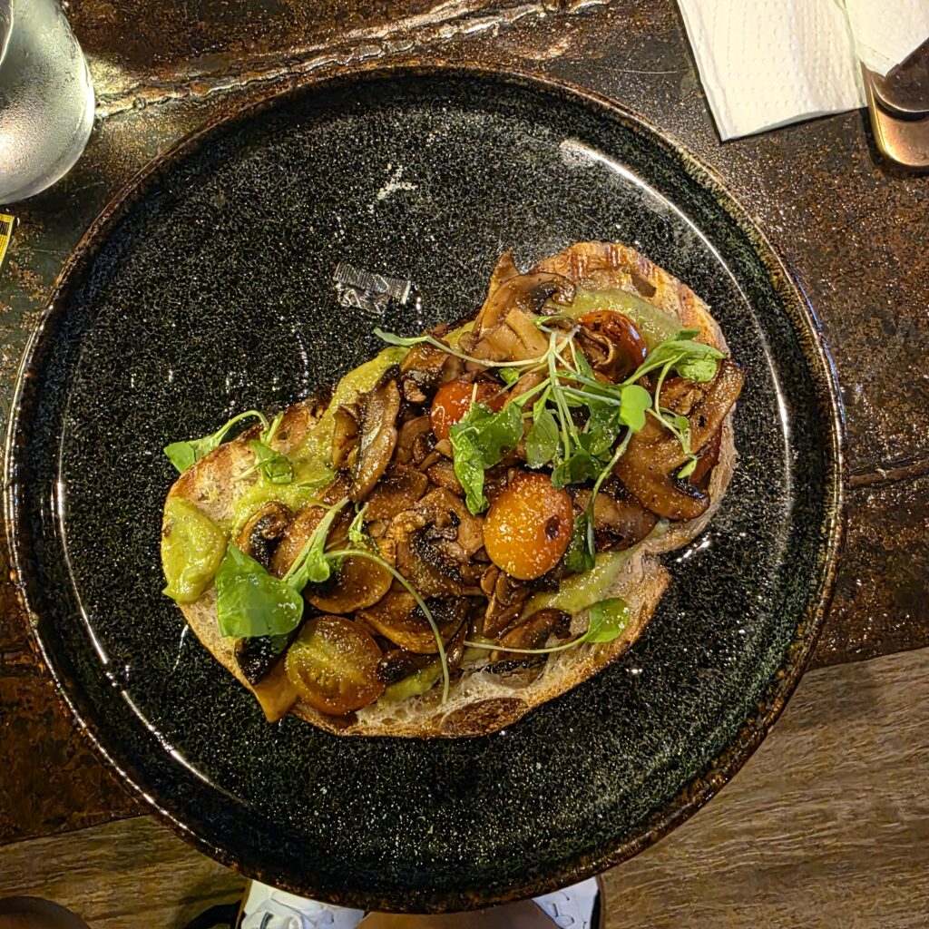 A beautiful omelet on a black plate in Cabrera Cafe in Panama City Panama