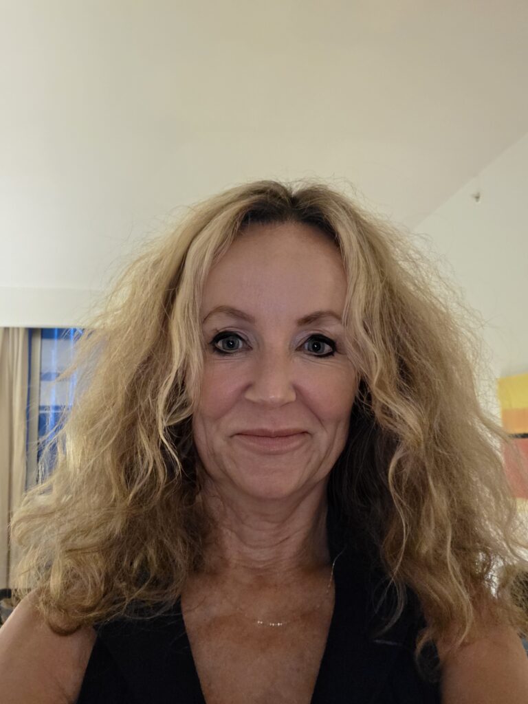 Photo of me with super fuzzy hair as proof of the humidity in Panama.