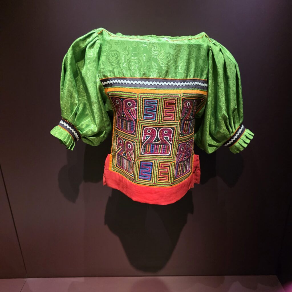 Color clothing of the Kuna people, a blouse of green, orange, blue, purple and yellow, displayed in the Mola Museum in Casco Viejo Panama