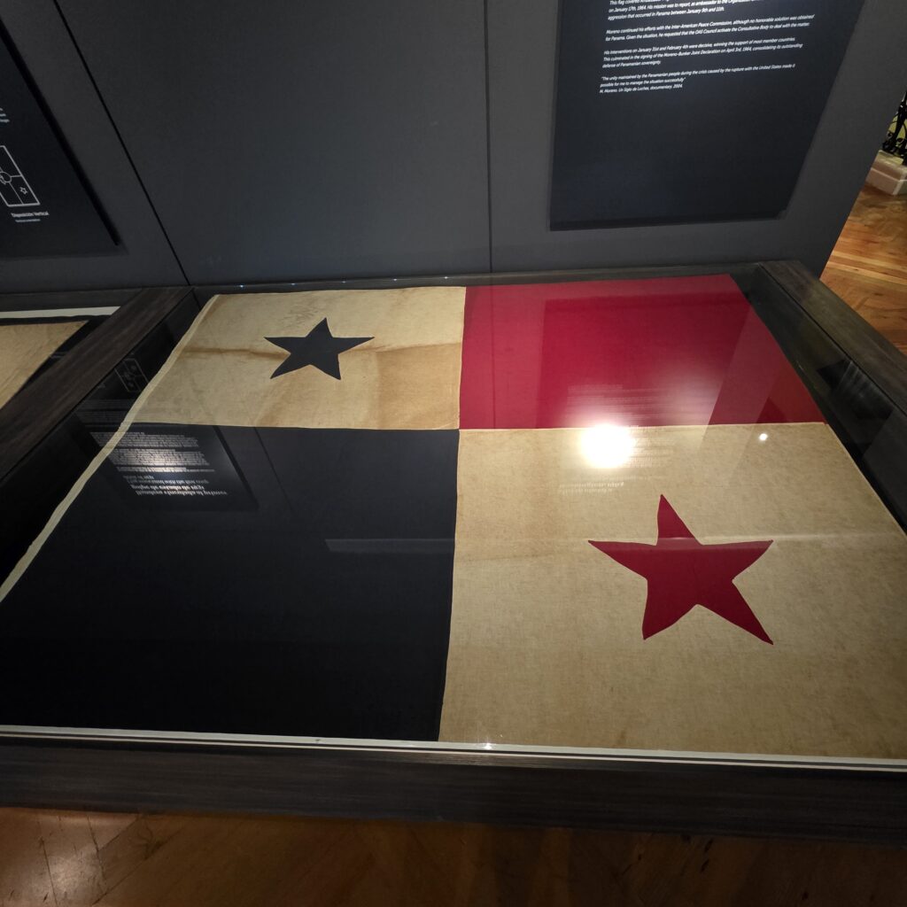 The Panamanian Flag - red, white and blue. It has four squares; one red, one blue and two white. The two white squares has one star each, one is blue and one is red
