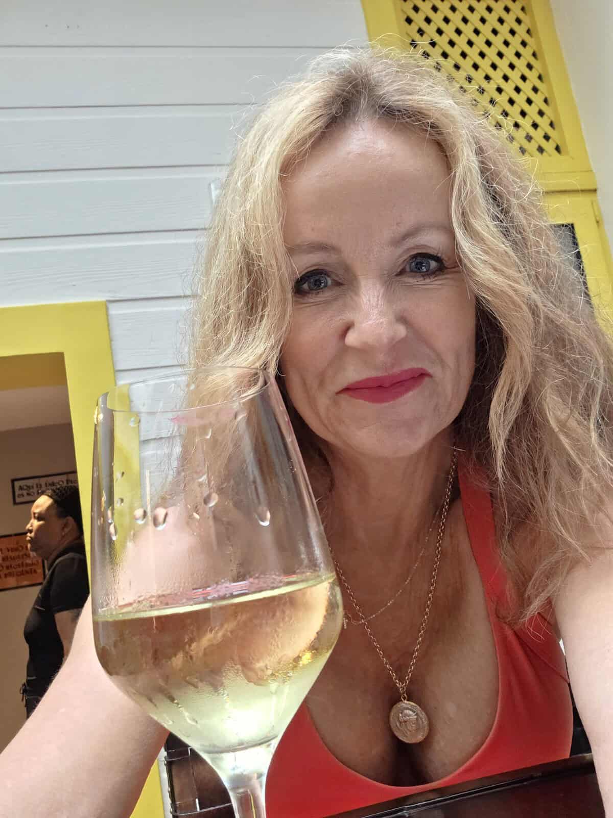 Me having a glass of white wine in Tasca La Candelaria tapa restaurant in Casco Viejo Panama