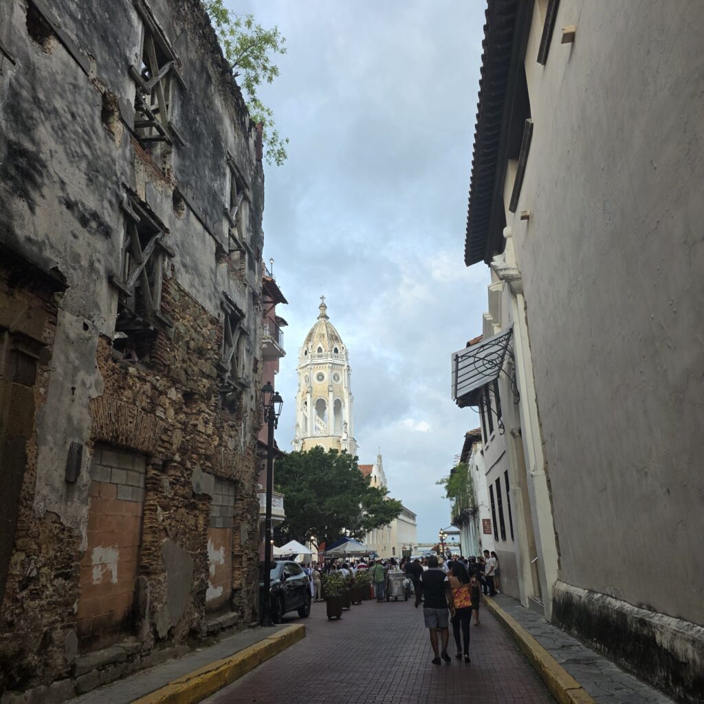 Old crumbling building, church steeple street view in Casco Viejo Panama