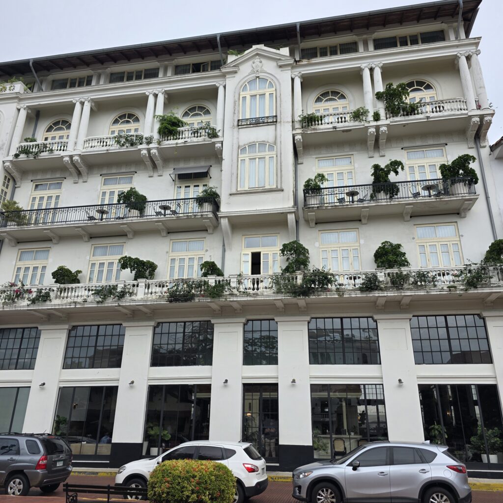Outside view of the all white American Trade Hotel in Casco Viejo Panama