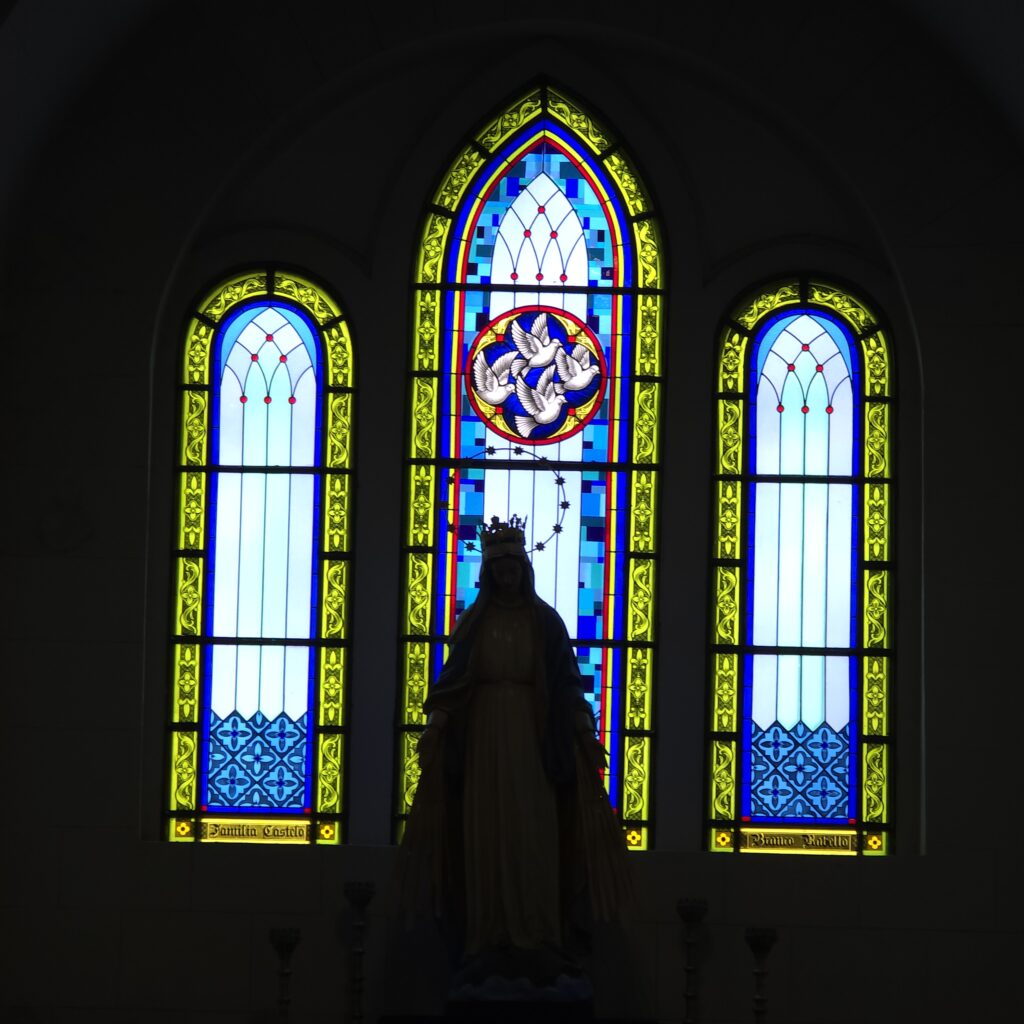 A stained glass window with mostly blue tones in the Mirador de San Francisco de Asis church in Casco Viejo Panama