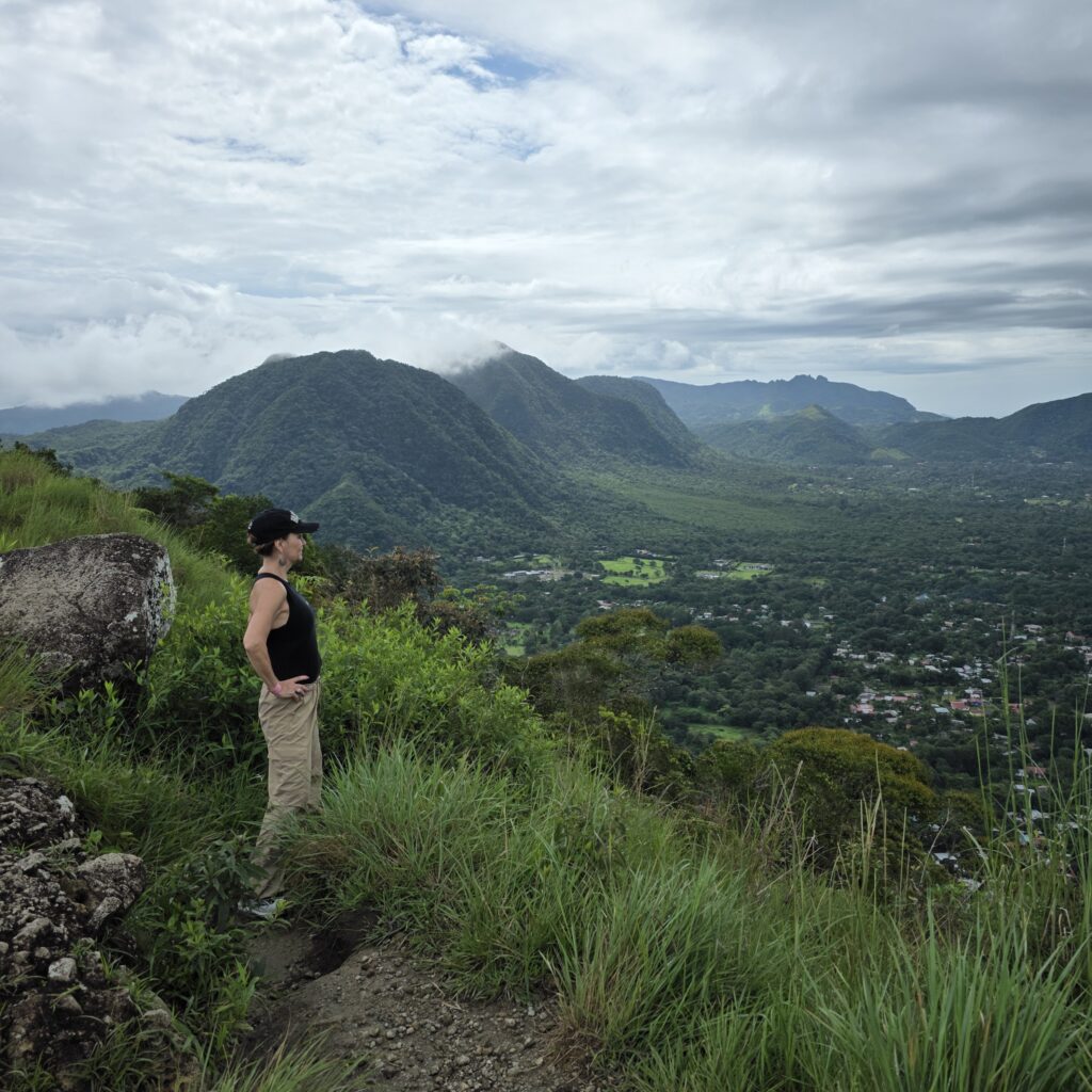 Me staring off into the distance at the top of La India Dormida Trail in Panama