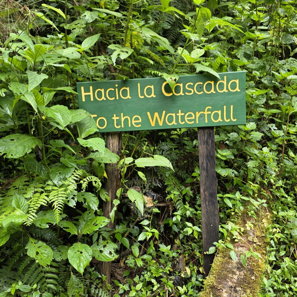 A sign for the waterfall along the Pipeline Trail in Boquete Panama